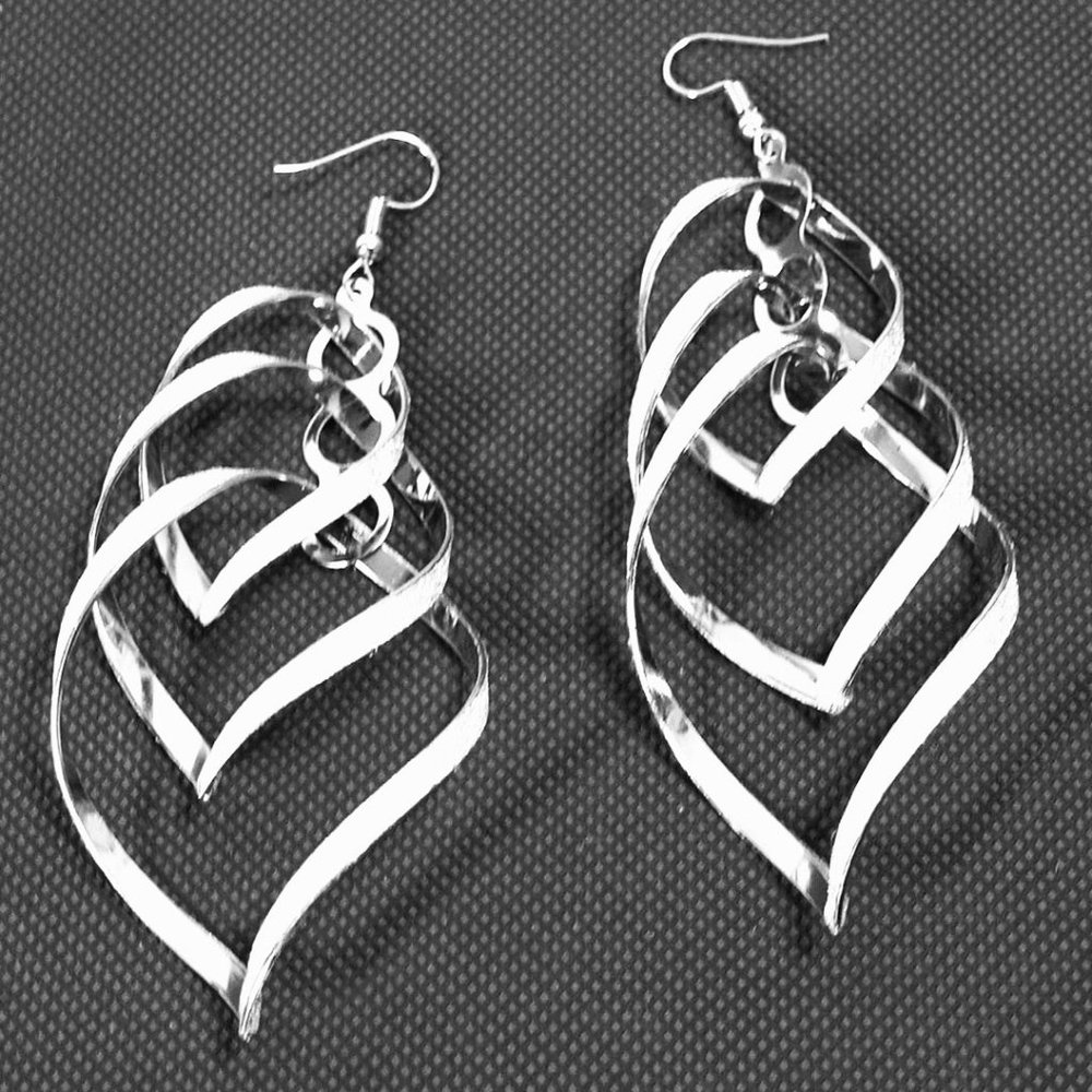 New silver toned earrings